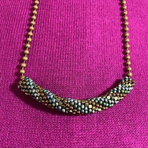 Handmade
peyote stitch woven Japanese seed bead rope pendant on brass ball chain